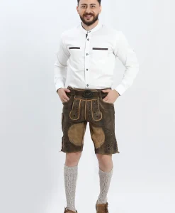 Lederhosen Men in Brown Color with Traditional Embroidery. Model is wearing White Traditional Shirt with Bavarian Socks and Shoes.