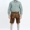 Lederhosen Men in Brown Color with Traditional Green Embroidery. Model is wearing Green Checkered Shirt with Bavarian Socks and Shoes.