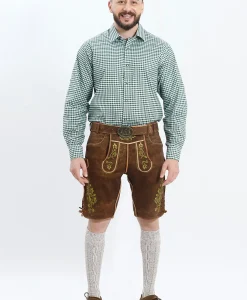 Lederhosen Men in Brown Color with Traditional Green Embroidery. Model is wearing Green Checkered Shirt with Bavarian Socks and Shoes.
