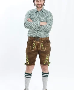 Lederhosen Men in Brown Color with Traditional Green Embroidery. Model is wearing checkered green shirt and Traditional Bavarian Shoes.